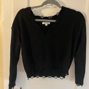 Distressed black sweater